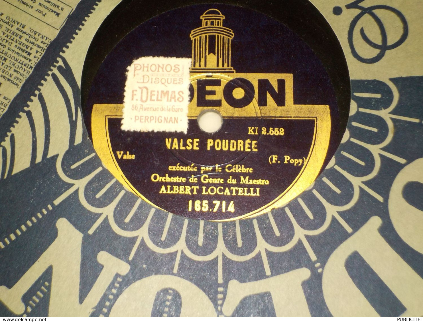 A close-up of a record

AI-generated content may be incorrect.